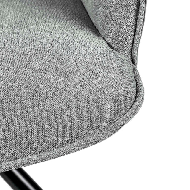 Curvy black upholstered chair