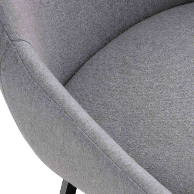 Curvy black upholstered chair