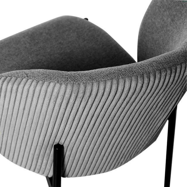 Curvy black upholstered chair