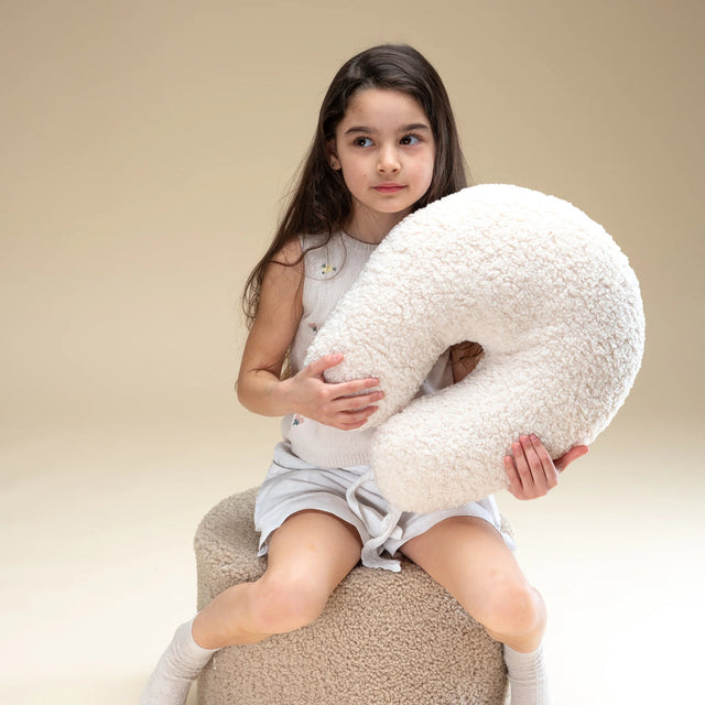 Almohada de color blanco crema