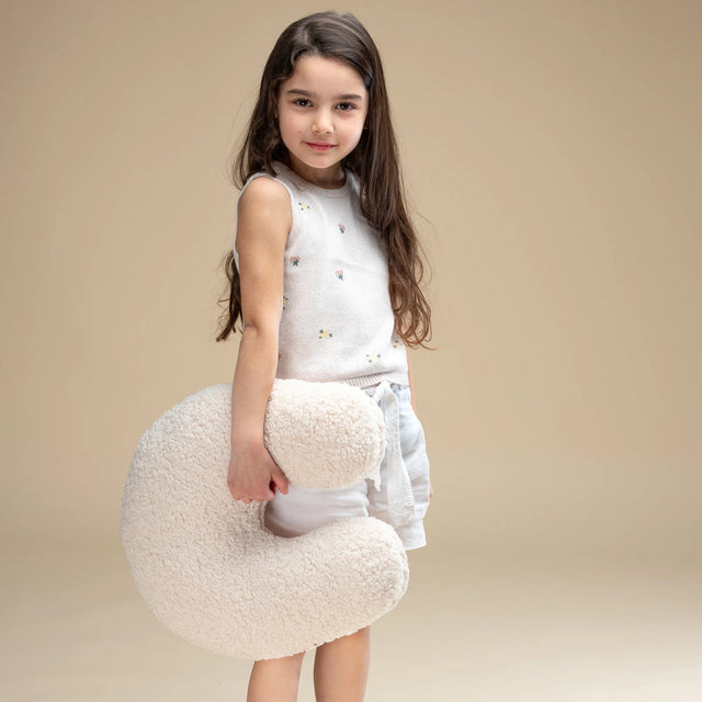 Almohada de color blanco crema