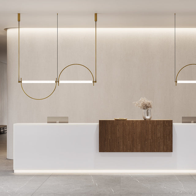 Vista frontal Lámparas colgantes Arc oro mate recepción Aromas del Campo Slowdeco