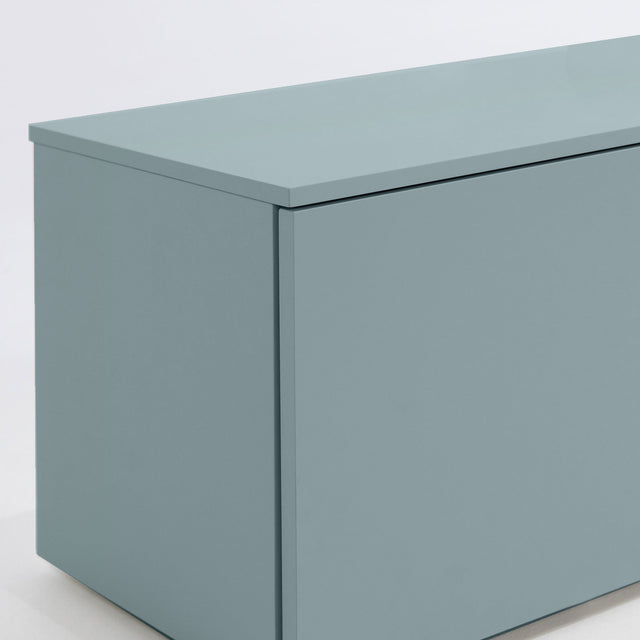 Vista lateral detalle Mueble TV Nolla 200 cm Azul cielo puerta apoyado suelo con niveladores Slowdeco